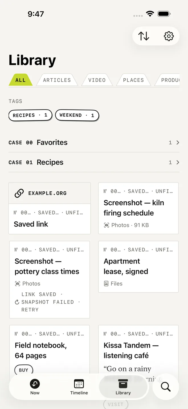 The Library tab. Index tabs run along the top, a row of tags with live counts sits beneath, and the archive is laid out as a grid of numbered catalog cards.